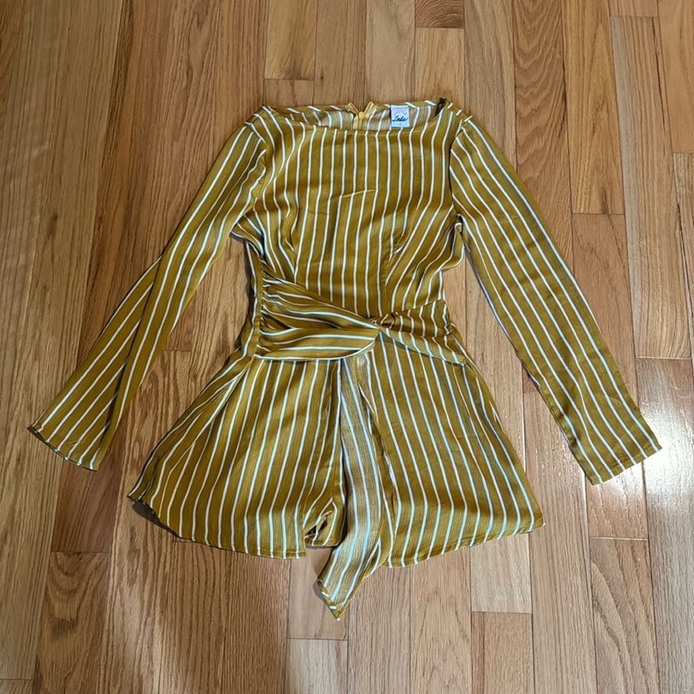 Small striped romper never been worn